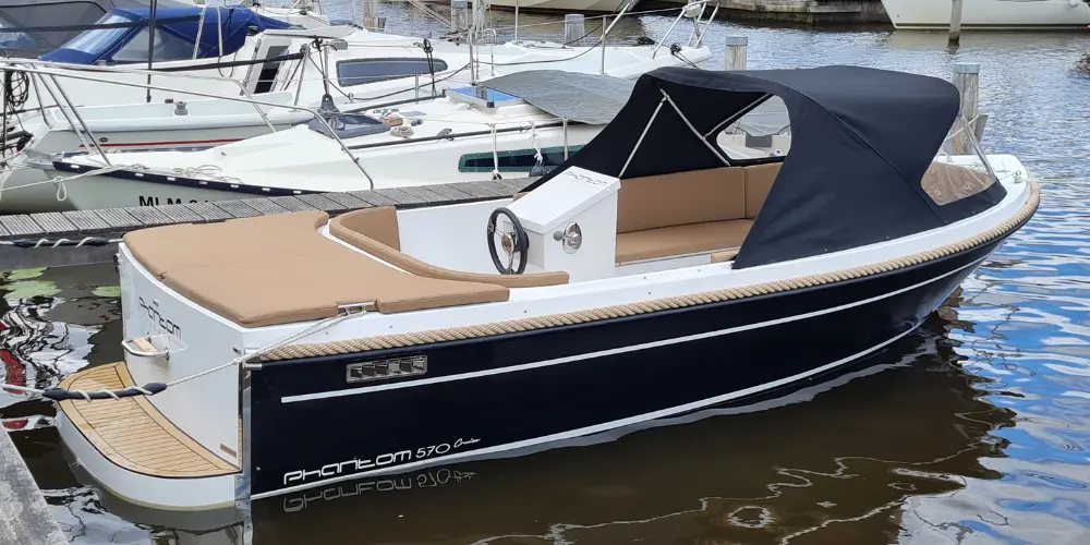 Phantom 570 Cruise mit 15PS Motor – Motorboot Lagerboot in Blau mit Sprayhood